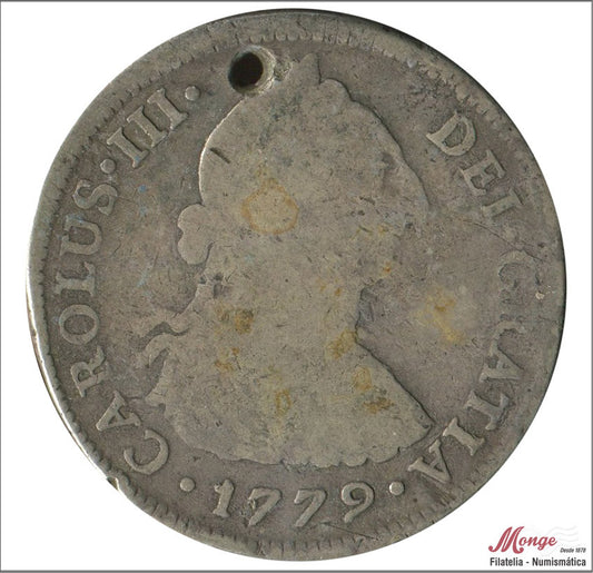 España - 1779 - Carlos III - Nº 01090 - BC- / F- - 4 Reales 1779 MJ Lima /12,45 gr. plata - perforada